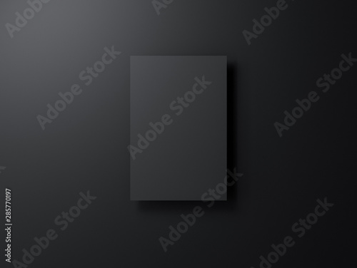 Fotomural Black poster mockup hanging on black wall
