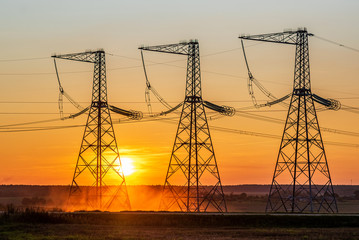 High voltage power line at sunset.