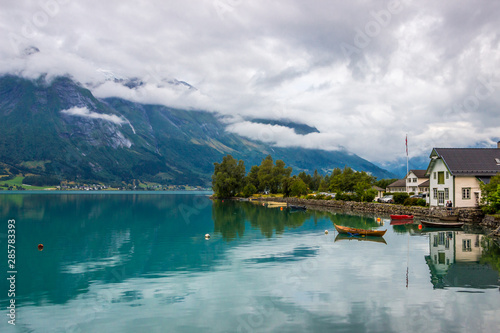 clouds over Oppstryn lake in Hjelle in Norway © tmag