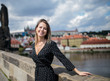 © Masson - woman on Charles bridge in Prague, Czech Perublic