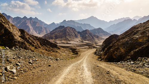 Cuadros en Lienzo Dirt road in Hajar mountains in Dubai, UAE