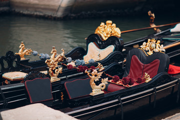 Venetian gondola and canal in Venice, Italy