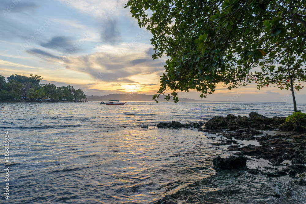 Sunset at Puerto Viejo beach, Costa Rica - obrazy, fototapety, plakaty 