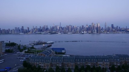 Fototapete - Timelipse of New york city skyline from New jersey, the end of the day and lights of the city