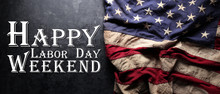 US American Flag On Worn Black Background. For USA Labor Day Celebration. With Happy Labor Day Weekend Text.