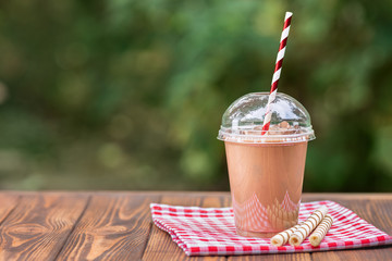 Canvas Print - milkshake in disposable plastic cup