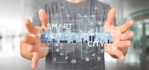 Poster - Businessman holding Smart city user interface with icon, stats and data 3d rendering