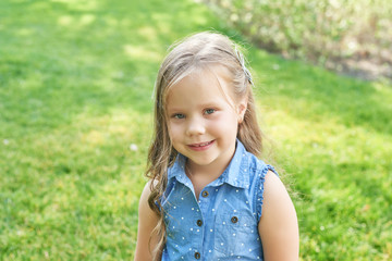 girl in the park on the grass