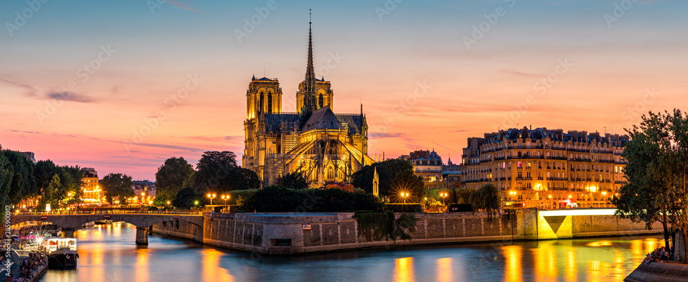 Notre Dame de Paris cathedral at sunset, France. Notre Dame de Paris, most beautiful Cathedral in Paris. Picturesque sunset over Cathedral of Notre Dame de Paris, destroyed in a fire in 2019, Paris. - obrazy, fototapety, plakaty 