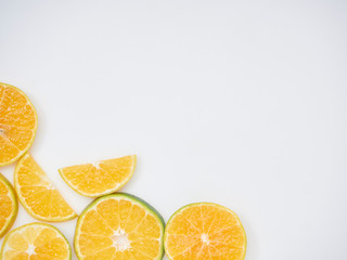 Wall Mural - Sliced ​​oranges on a white background