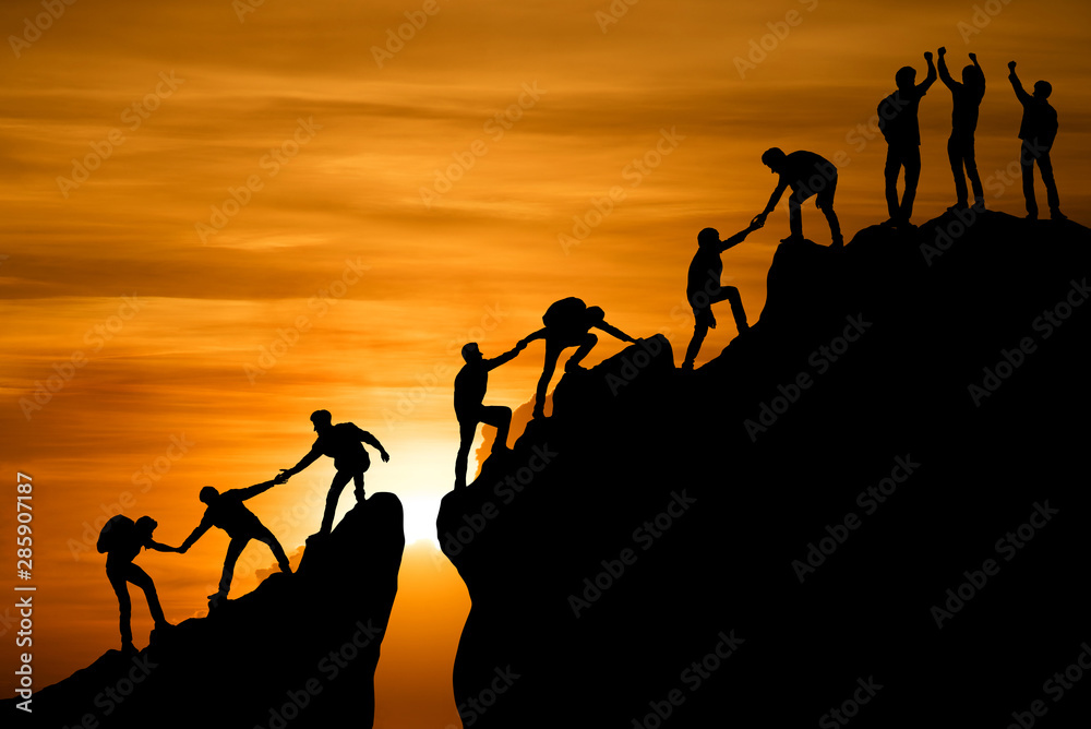 Group of people on peak mountain climbing helping team work , travel trekking success business concept - obrazy, fototapety, plakaty 