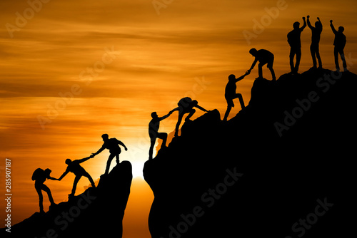 Fotomural Group of people on peak mountain climbing helping team work , travel trekking su