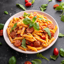 Sausage Penne Pasta With Tomato Sauce And Fresh Herbs