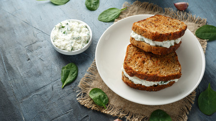 Wall Mural - Ricotta cheese spinach sandwich with coffee. healthy breakfast