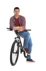 Poster - Handsome young man with modern bicycle on white background