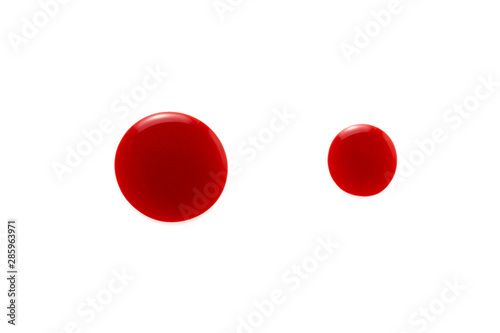 Fotomural Red color lip gloss drop on background