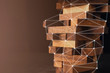 © whyframeshot - business organize  management strategy ideas concept wood stack block tower arranging with dark background