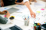close up hand of business creative staff presentation with organize chart diagram and work flow to client and friend