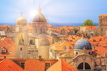 Summer Mediterranean Cityscape - View Of The Roofs Of The Old Town Of Dubrovnik With The Church Of St. Blaise And The Assumption Cathedral, On The Adriatic Coast Of Croatia
