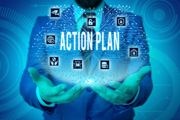 Writing note showing Action Plan. Business concept for detailed plan outlining actions needed to reach goals or vision Male wear formal work suit presenting presentation smart device