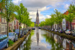 Delft, Netherlands - May 2, 2019 - The canals and waterways in the city of Delft in The Netherlands on a sunny day.