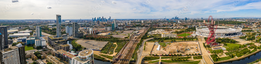 August 10, 2019. London, UK. Aerial view of the Olympic park in London with the the Olympic Stadium and the ArcellorMittal Orbit tower. - obrazy, fototapety, plakaty 