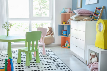 Wall Mural - Stylish interior of modern playroom in kindergarten