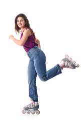 Wall Mural - Teenage girl on roller skates against white background