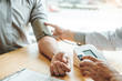 © joyfotoliakid - Doctor Measuring arterial blood pressure man patient on right arm Health care hospital and medicine concept