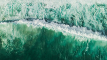 Aerial Wave Background. Drone Shot Directly From Above, Green Turquoise Color, Huge Waves. Empty Space