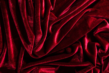 Wall Mural - Background image of crumpled fabric. Red velvet