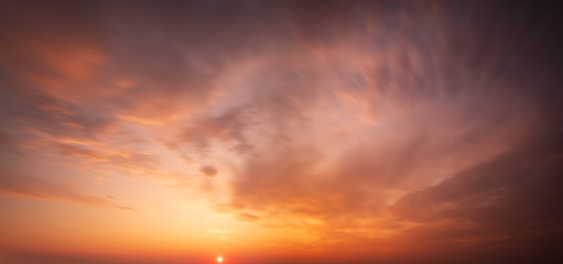 Wall Mural - fiery sunset, colorful clouds in the sky