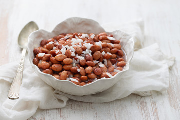 Sticker - boiled beans with onion in white bowl