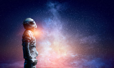 Wall Mural - spaceman and the planet earth abstract theme