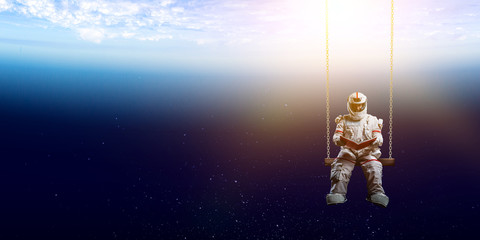 Wall Mural - spaceman and the planet earth abstract theme