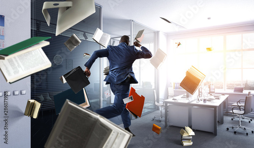 Cuadros en Lienzo Cheerful businessman jumping high. Mixed media