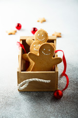 Wall Mural - Homemade gingerbread men in wooden box