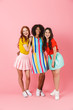 © Drobot Dean - Three lovely young girls wearing summer outfit standing