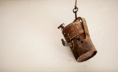 old rusty mining lamp