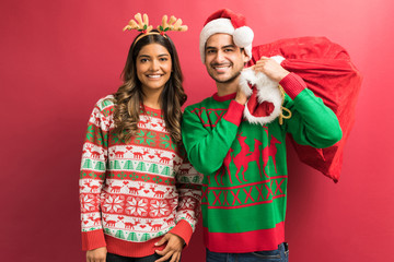 Attractive Boyfriend And Girlfriend With Christmas Presents