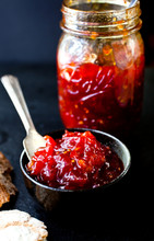 Close Up Of Sweet Tomato Jam With Honey And Vanilla In Bowl