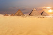 Sandy desert of Giza and beautiful pyramids view