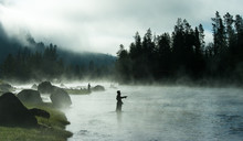 Man Fly Fishing In River