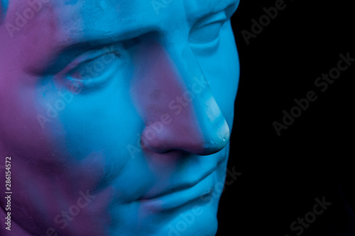 Fotografía Gypsum copy of ancient statue Augustus head isolated on black background