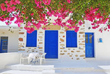 Fototapeta Do pokoju - traditional yard with bougainvilleas at Ano Koufonisi island Cyclades Greece