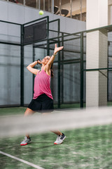 Wall Mural - woman playing padel