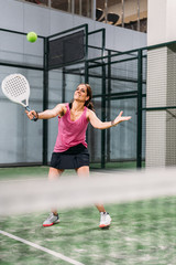 Wall Mural - woman playing padel