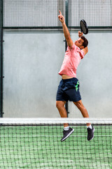 Wall Mural - Man playing padel