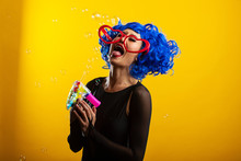 Fun And Colorful Portrait Of Woman With Blue Wig