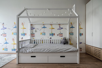 Wall Mural - Stylish modern children room with white walls with pictures